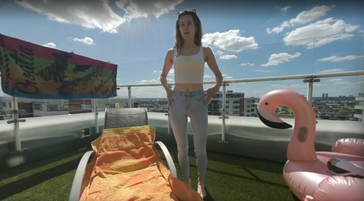 Skinny Josie Rocks Dildo Play in Rooftop Heat - Image 2